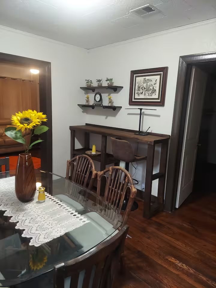 2824 5th Street Bay City, TX 77414 - Photo 9 of 17 a dining room with furniture and wooden floor