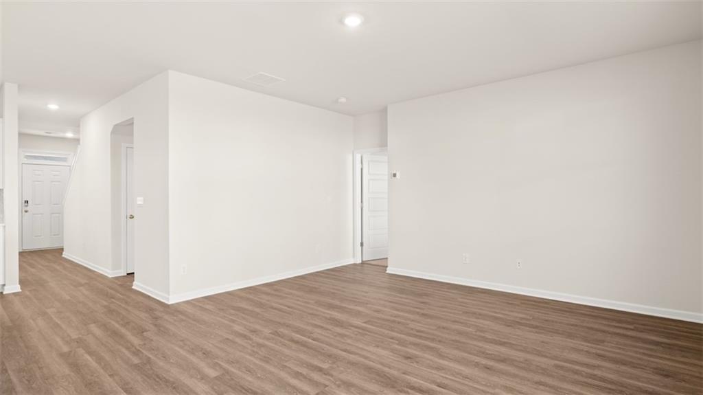 214 Cattle Drive Perry, GA 31069 - Photo 17 of 39 a view of an empty room with wooden floor