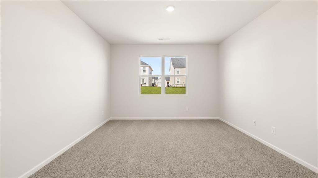 214 Cattle Drive Perry, GA 31069 - Photo 20 of 39 a view of an empty room with a window