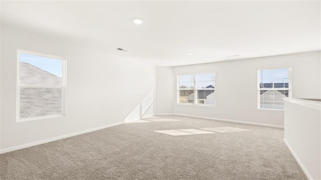 214 Cattle Drive Perry, GA 31069 - Photo 29 of 39 an empty room with windows