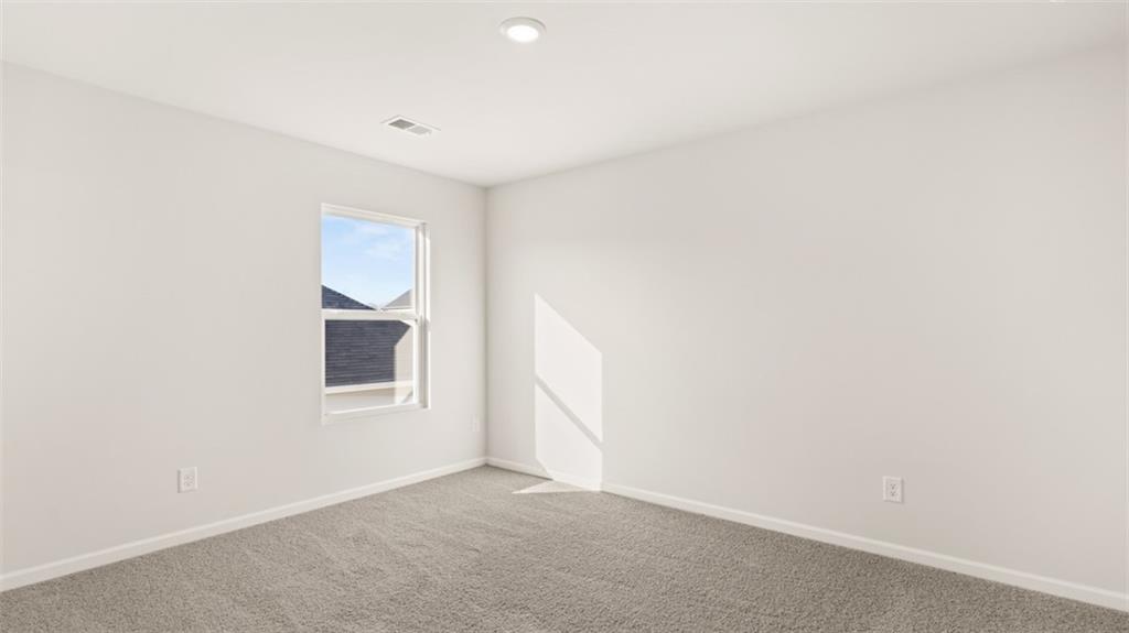 214 Cattle Drive Perry, GA 31069 - Photo 32 of 39 a view of an empty room with a window