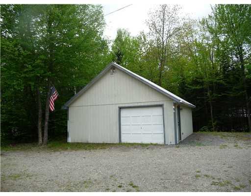 263 Berry Hill Road New Portland, ME 04961 - Photo 7 of 13 Parking Lot/Garage. This is a garage...