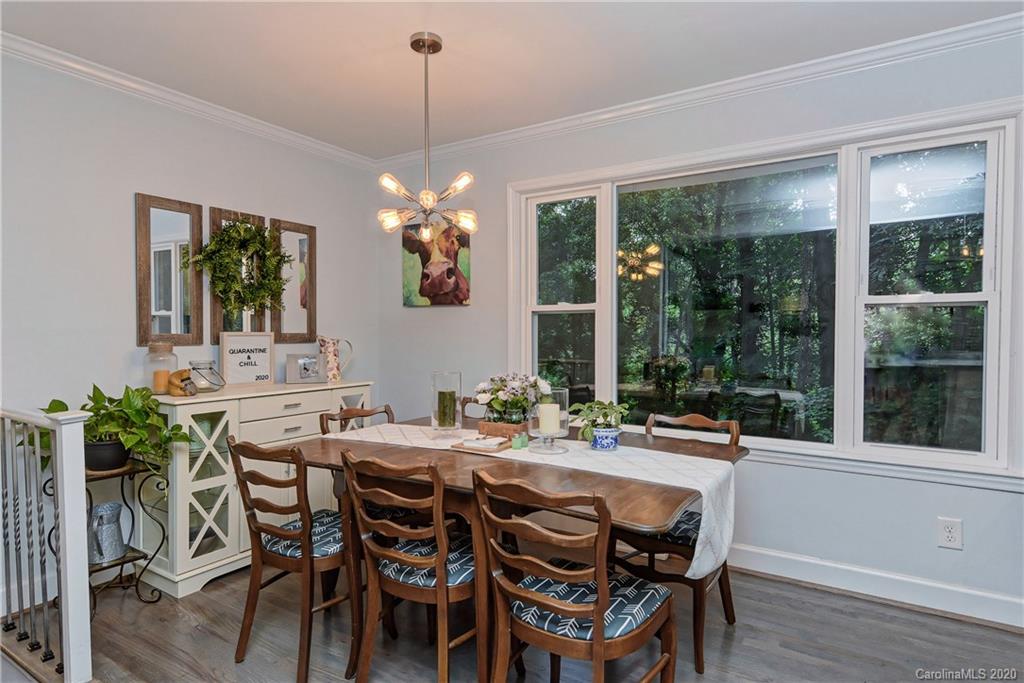 7407 Watercrest Road Charlotte, NC 28210 - Photo 14 of 42 a view of a dining room with furniture window and outside view