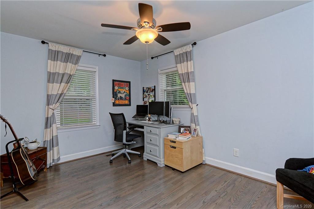 7407 Watercrest Road Charlotte, NC 28210 - Photo 19 of 42 a workspace with furniture and a window