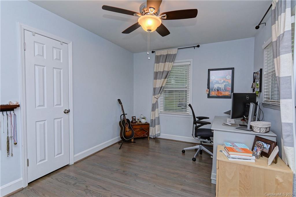 7407 Watercrest Road Charlotte, NC 28210 - Photo 20 of 42 a view of a workspace with furniture and a window