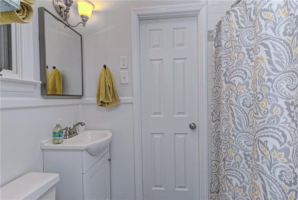 7407 Watercrest Road Charlotte, NC 28210 - Photo 29 of 42 a bathroom with a sink and a toilet