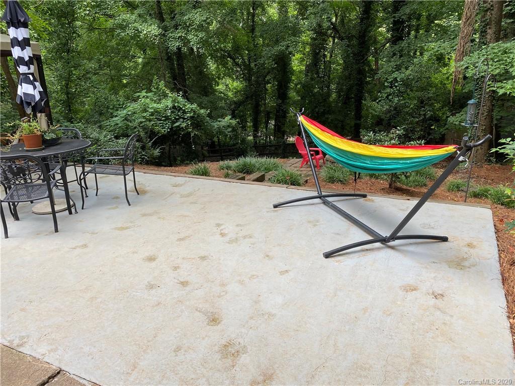7407 Watercrest Road Charlotte, NC 28210 - Photo 32 of 42 an outdoor space with chairs