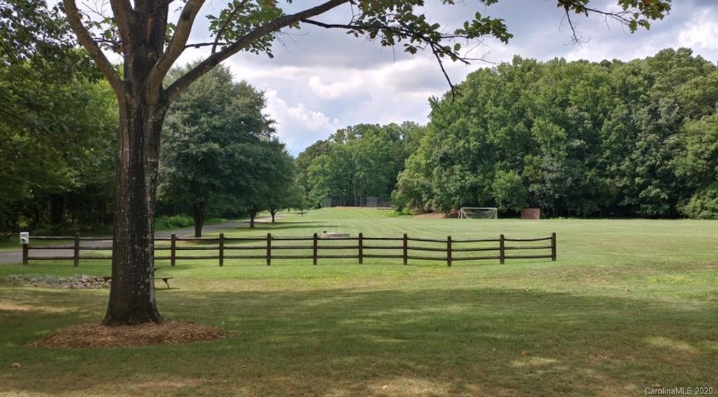 7407 Watercrest Road Charlotte, NC 28210 - Photo 41 of 42 a view of park with bench and trees