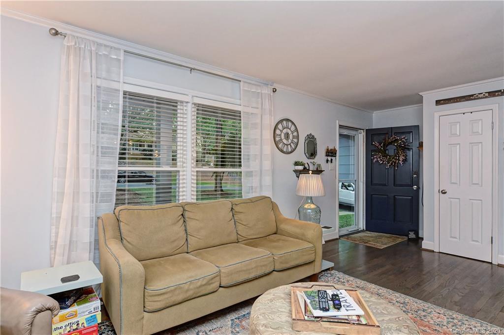 7407 Watercrest Road Charlotte, NC 28210 - Photo 7 of 42 a living room with furniture and a window