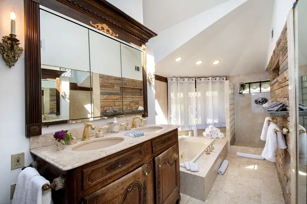 a kitchen with a sink and a refrigerator