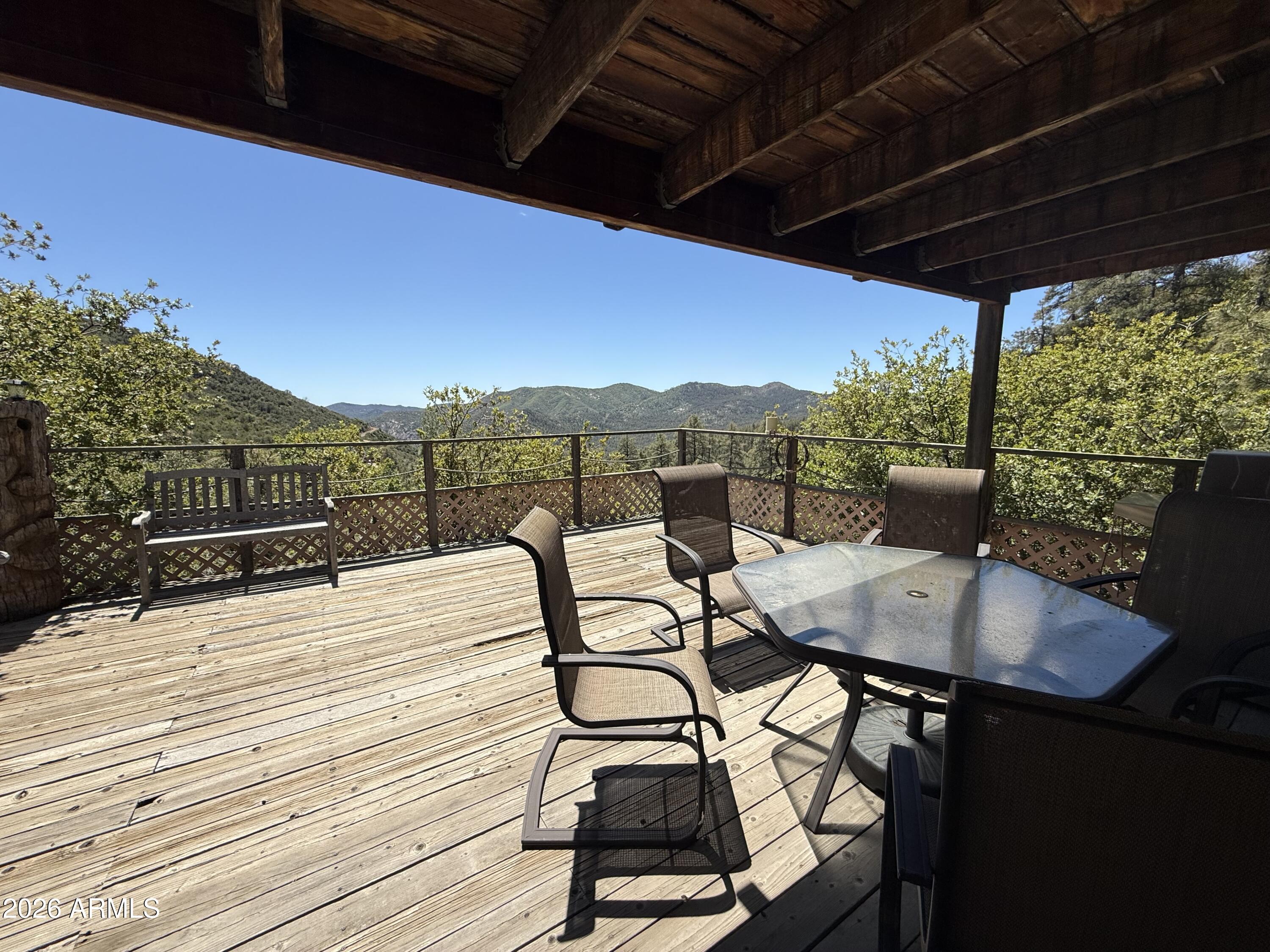 22406 South Eagle Mine Road Crown King, AZ 86343 - Photo 3 of 20 a view of a terrace with furniture and a yard