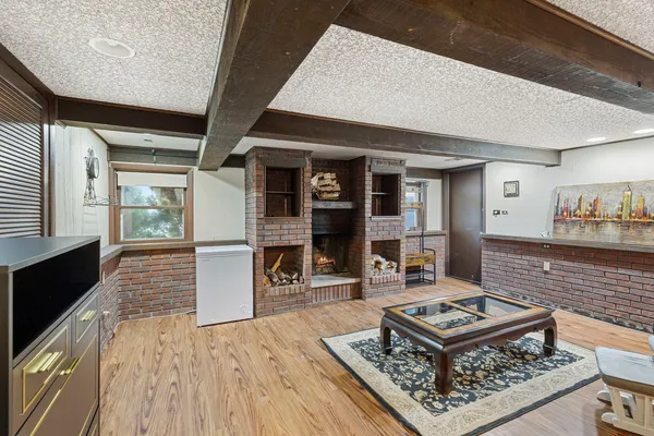 a living room with furniture and a rug