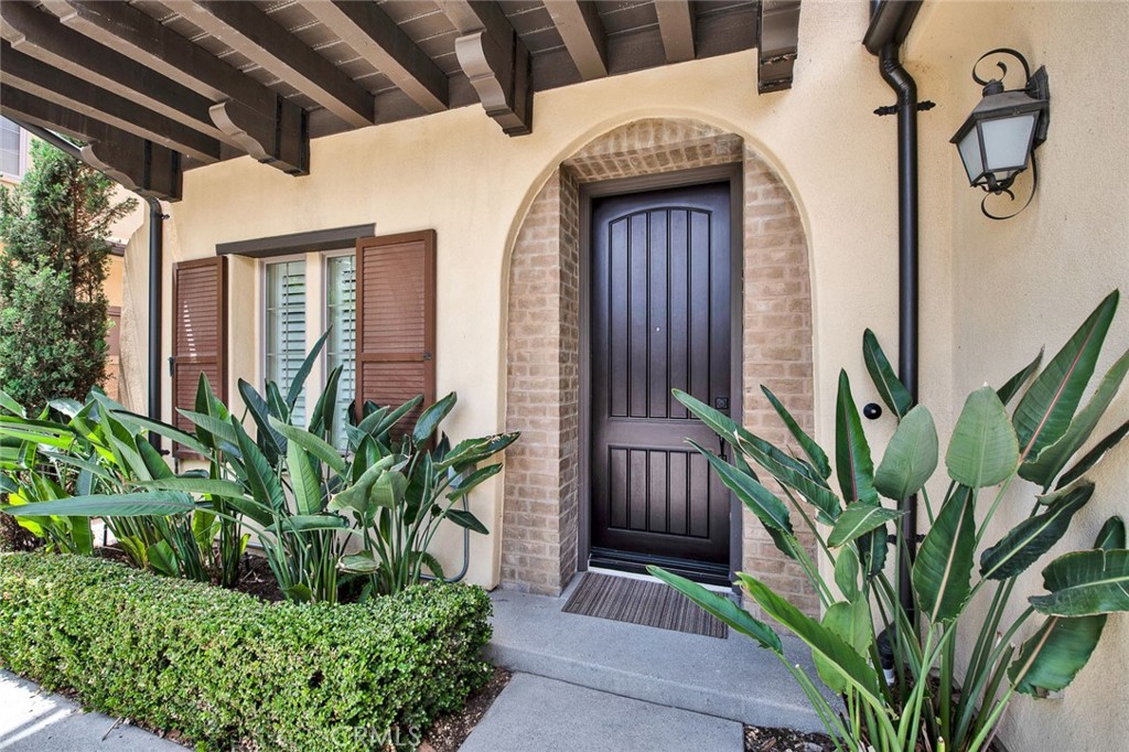 23 White Sage Irvine, CA 92618 - Photo 2 of 3 a front view of house with small garden