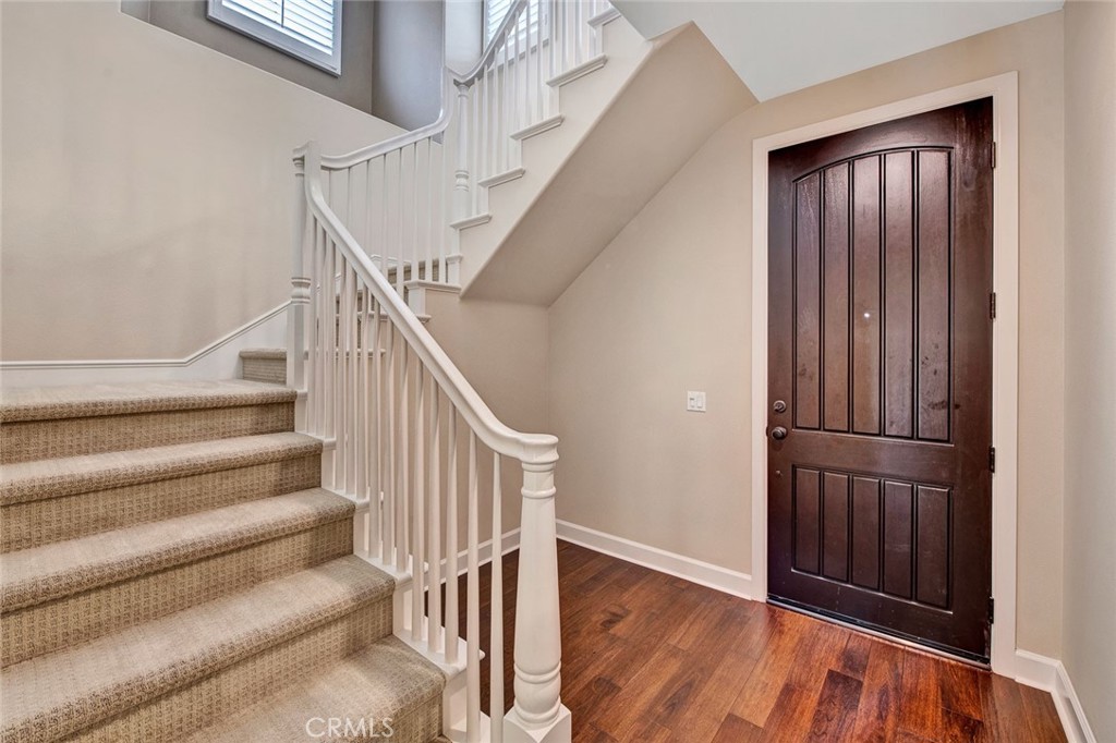 23 White Sage Irvine, CA 92618 - Photo 3 of 3 a view of staircase with white walls and railing
