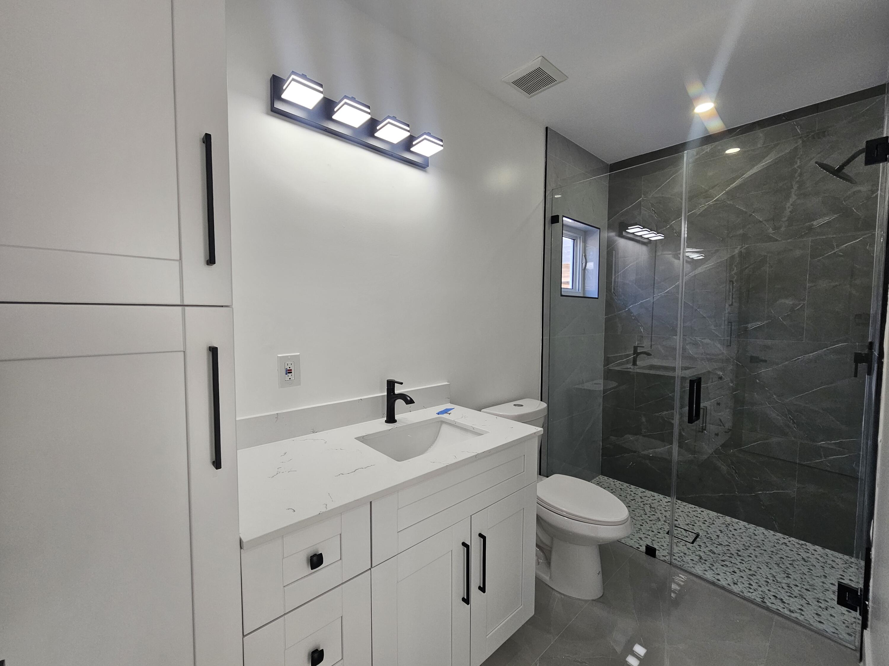 2 Buttonwood Drive Key Largo, FL 33037 - Photo 19 of 28 Guest Bath down