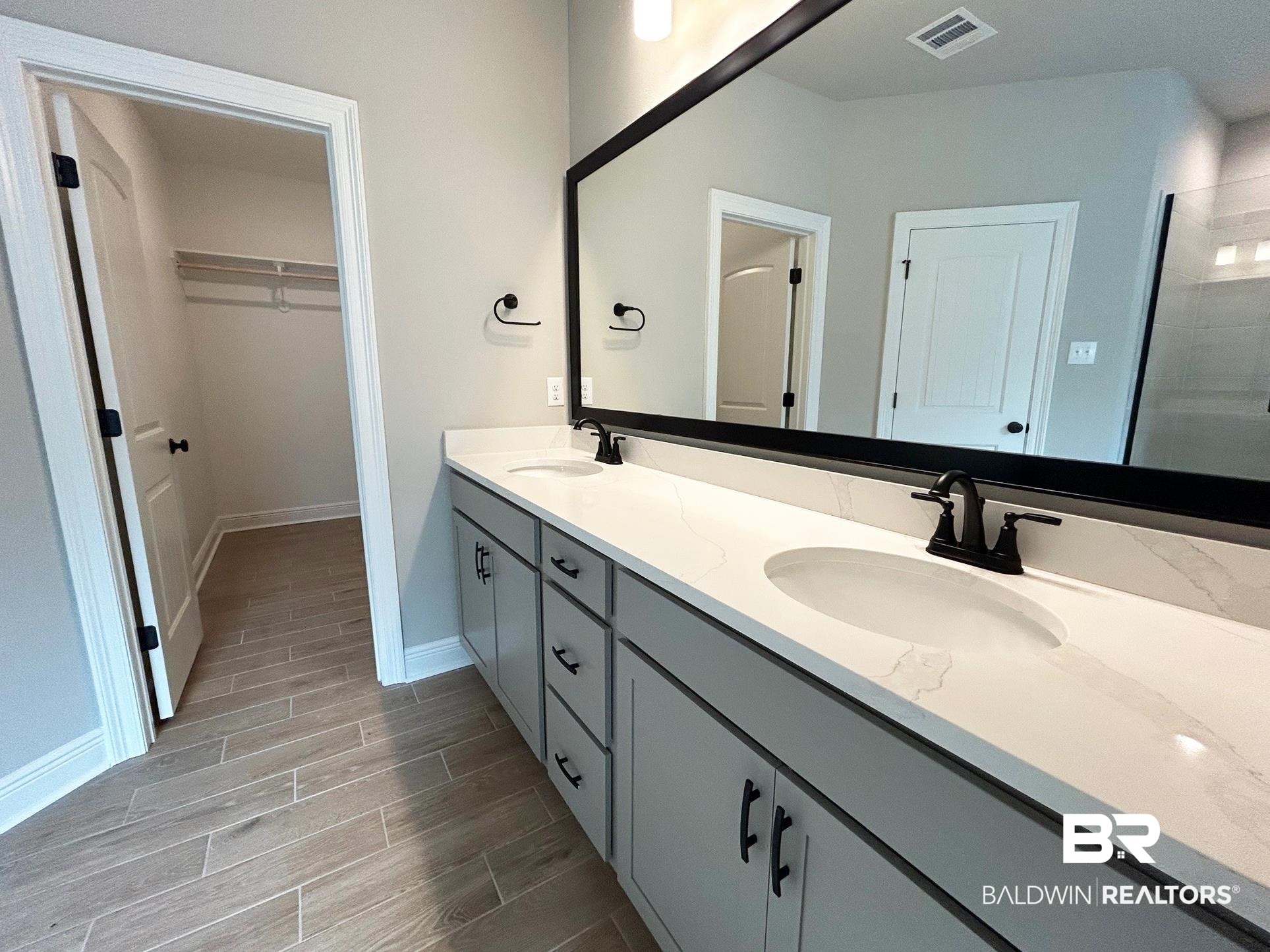 808 Sumter Loop Foley, AL 36535 - Photo 8 of 18 Bathroom featuring vanity and walk in shower