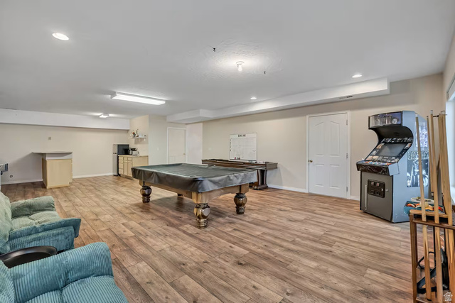 11789 Nicklaus Road Sandy, UT 84092 - Photo 7 of 58 Rec room with billiards, light wood-style flooring, and recessed lighting