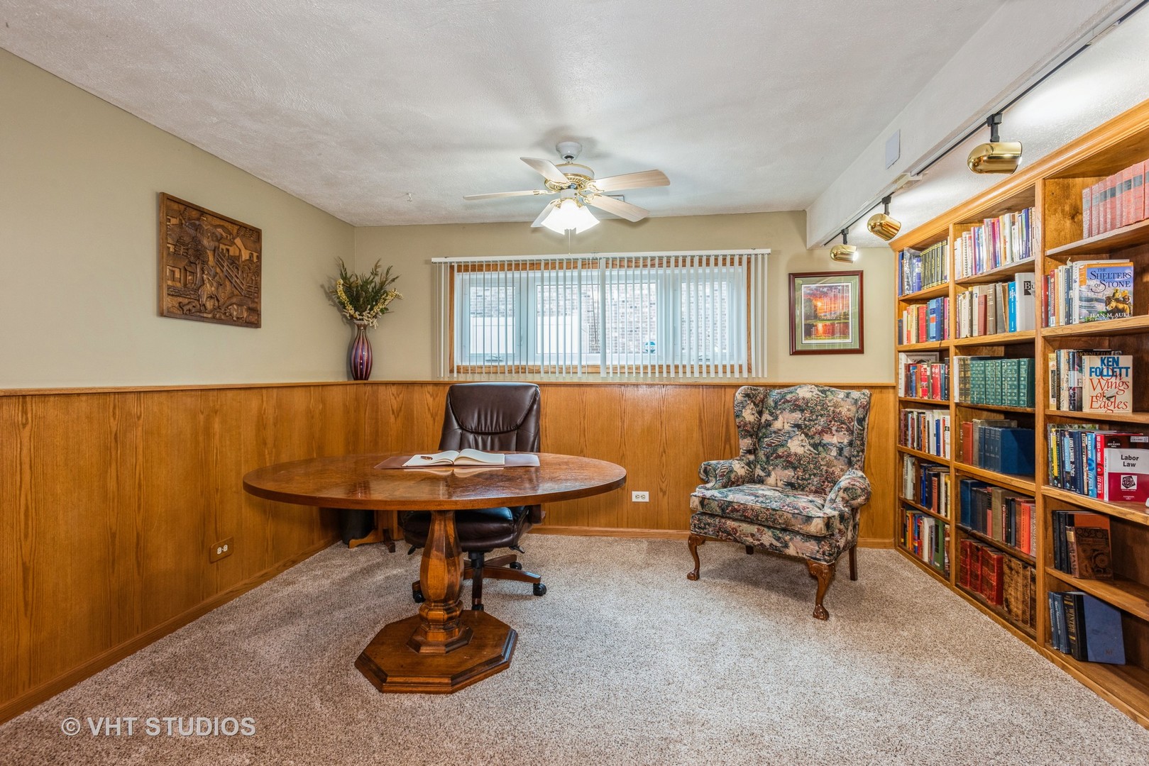 17W347 Forestview Road Bensenville, IL 60106 - Photo 17 of 25 a living room with furniture a bookshelf and a window