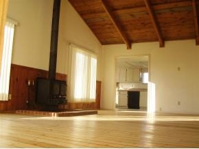 2740 North Reed Road Chino Valley, AZ 86323 - Photo 4 of 8 a view of empty room with wooden floor and fan
