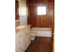 2740 North Reed Road Chino Valley, AZ 86323 - Photo 7 of 8 a bathroom with a sink a toilet and shower