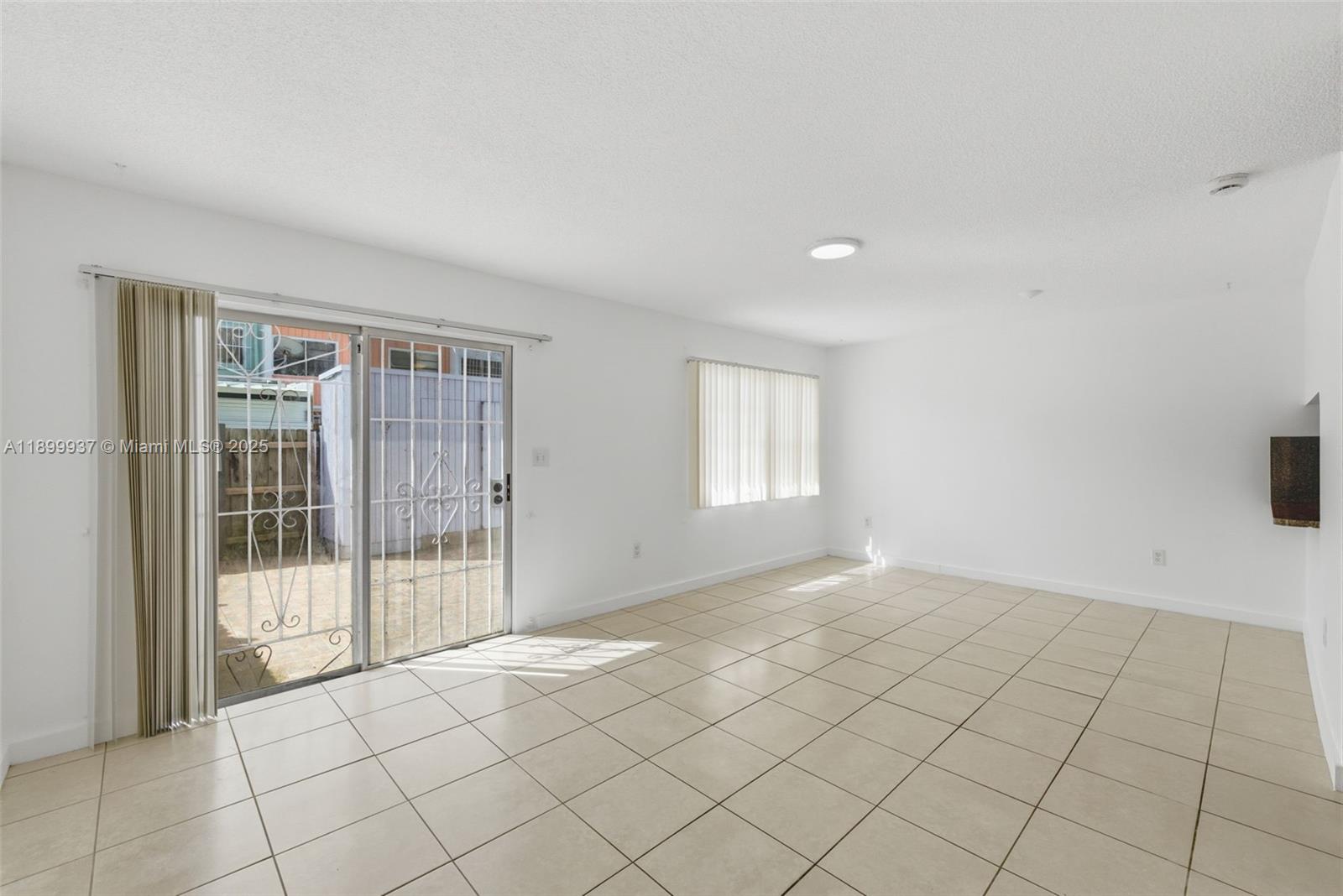624 Northwest 11th Street, Unit 624 Miami, FL 33136 - Photo 11 of 30 a view of an empty room and window