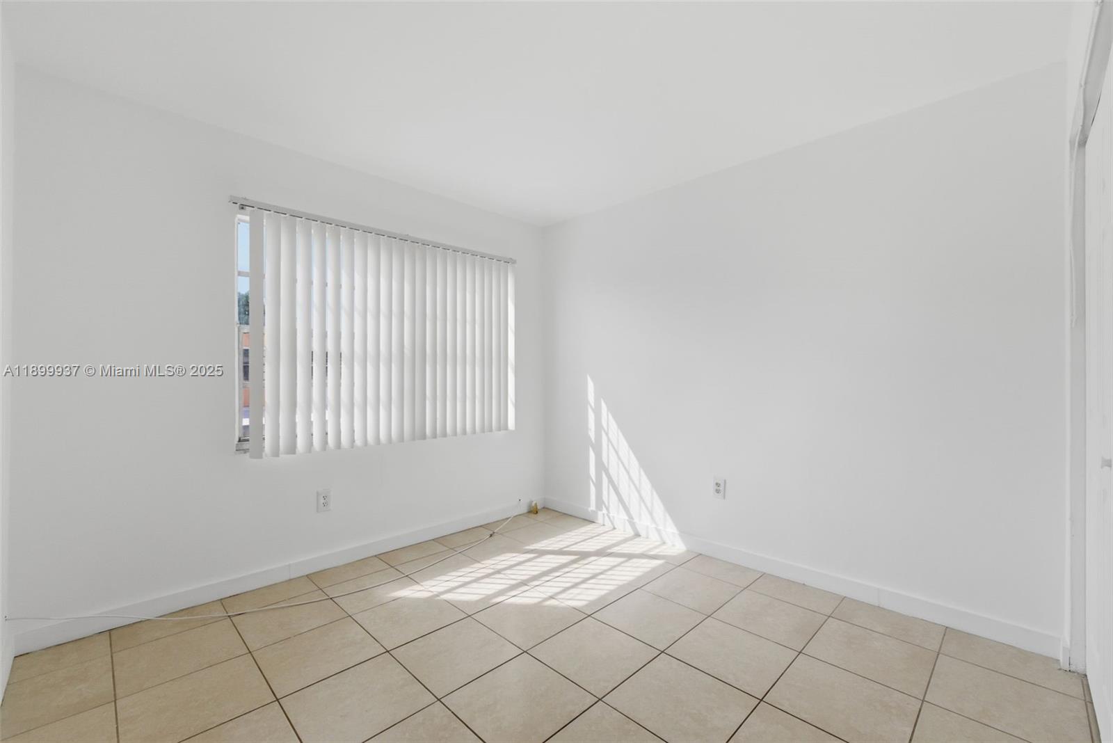 624 Northwest 11th Street, Unit 624 Miami, FL 33136 - Photo 16 of 30 a view of an empty room with window