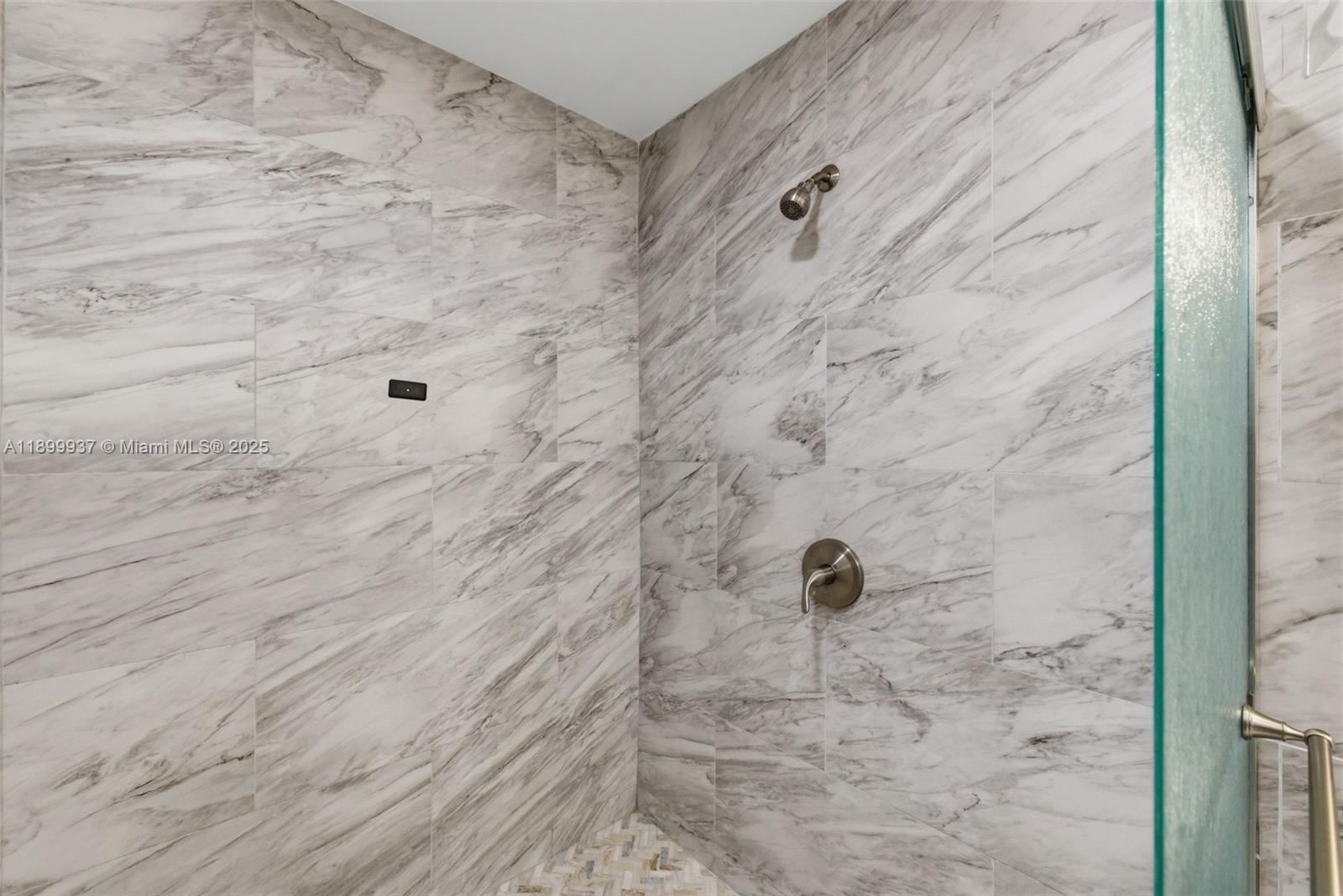 624 Northwest 11th Street, Unit 624 Miami, FL 33136 - Photo 23 of 30 a bathroom with a shower