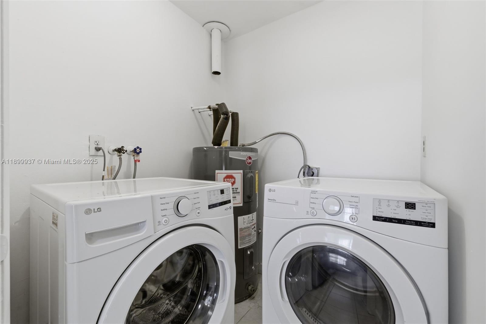 624 Northwest 11th Street, Unit 624 Miami, FL 33136 - Photo 26 of 30 a utility room with dryer and washer