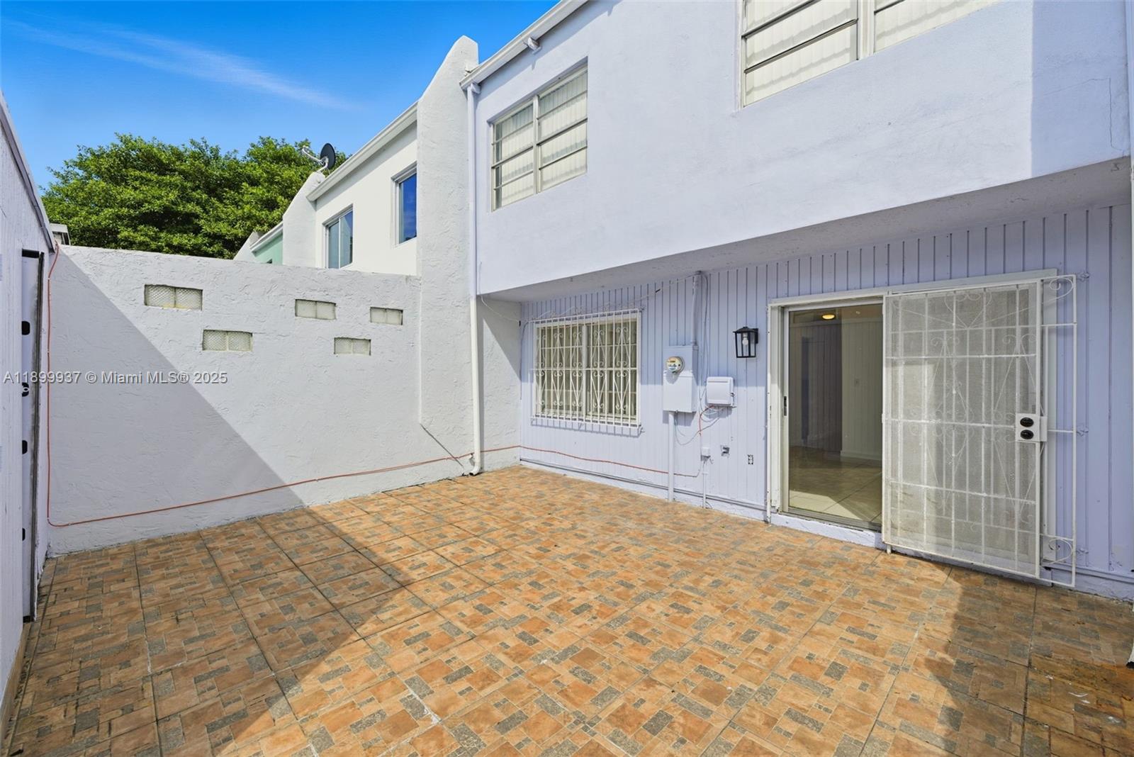 624 Northwest 11th Street, Unit 624 Miami, FL 33136 - Photo 28 of 30 a view of an house with backyard and garden