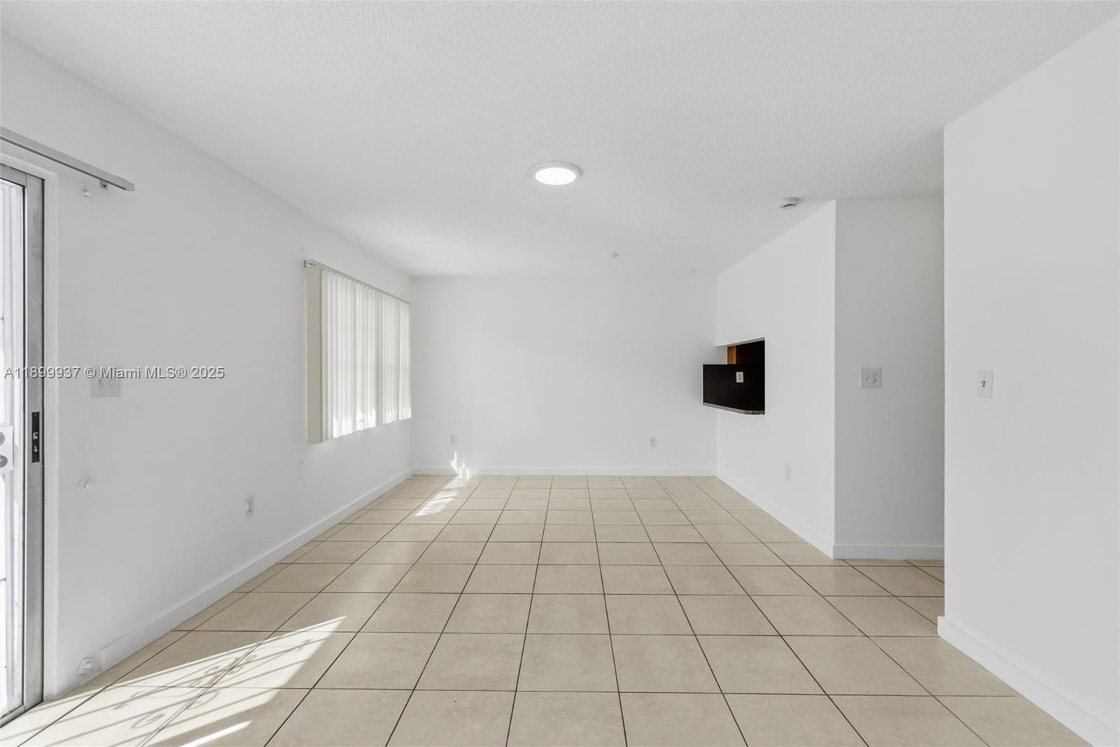 624 Northwest 11th Street, Unit 624 Miami, FL 33136 - Photo 7 of 30 a view of an empty room and window