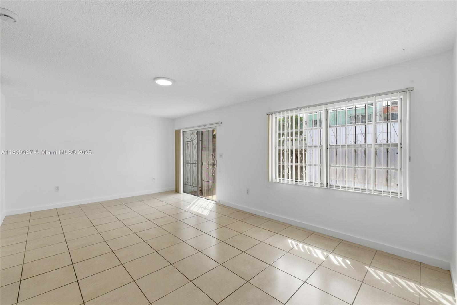 624 Northwest 11th Street, Unit 624 Miami, FL 33136 - Photo 10 of 30 a view of an empty room with window