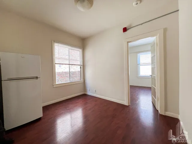 a view of livingroom with hardwood floor and window