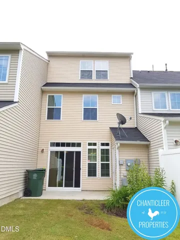 a view of a house with a swimming pool