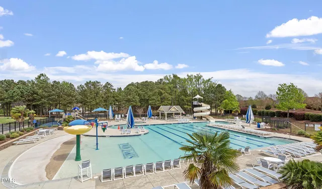 a view of a patio with swimming pool