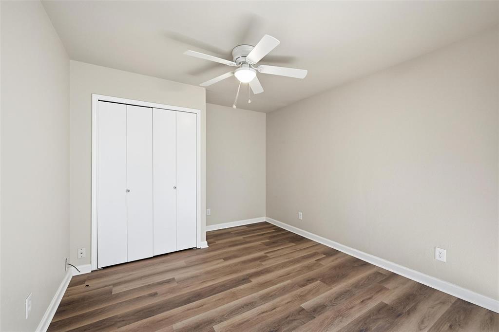 4526 Carr Street The Colony, TX 75056 - Photo 10 of 19 wooden floor in an empty room