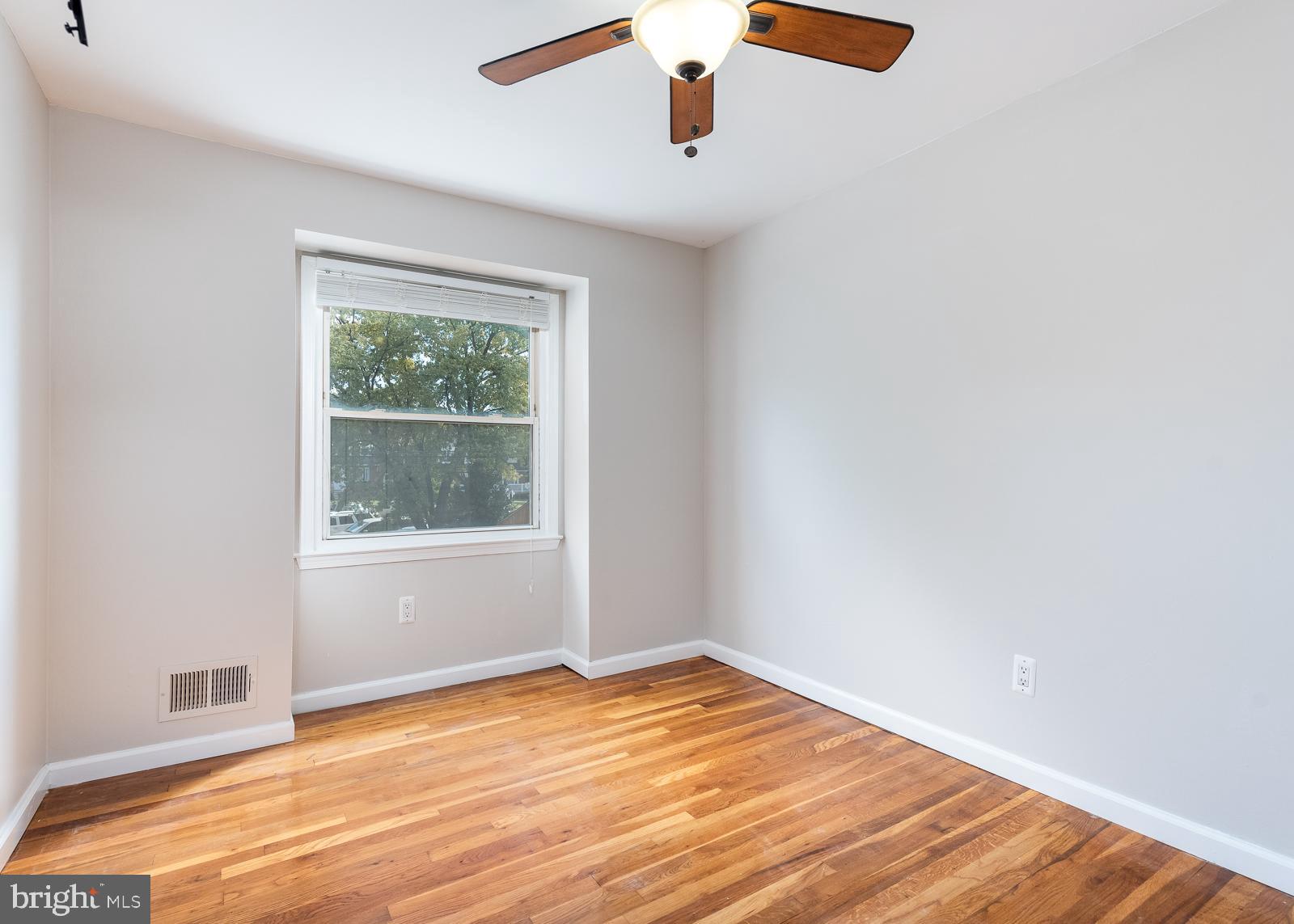 5747 Utrecht Road Baltimore, MD 21206 - Photo 18 of 25 Bedroom with wood flooring