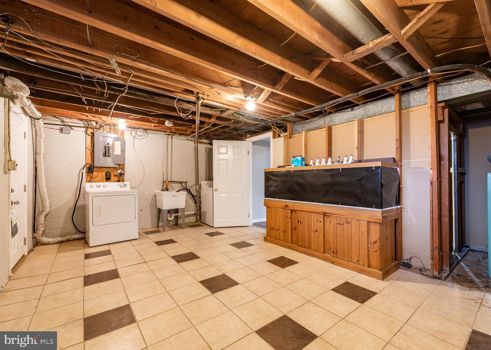5747 Utrecht Road Baltimore, MD 21206 - Photo 25 of 25 Storage and laundry area of basement