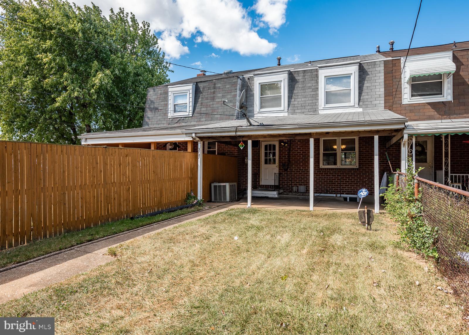 5747 Utrecht Road Baltimore, MD 21206 - Photo 6 of 25 Backyard with covered porch and access to basement
