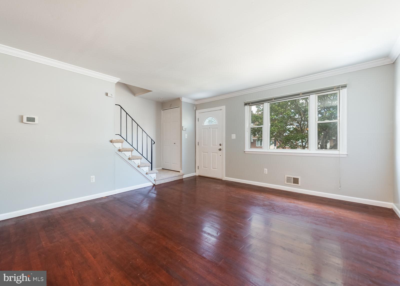 5747 Utrecht Road Baltimore, MD 21206 - Photo 8 of 25 Living room with wood flooring