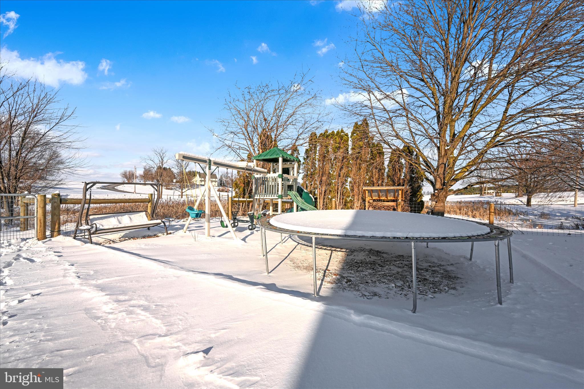 204 Reistville Road Myerstown, PA 17067 - Photo 43 of 55 a view of a backyard with table and chairs with wooden fence and plants