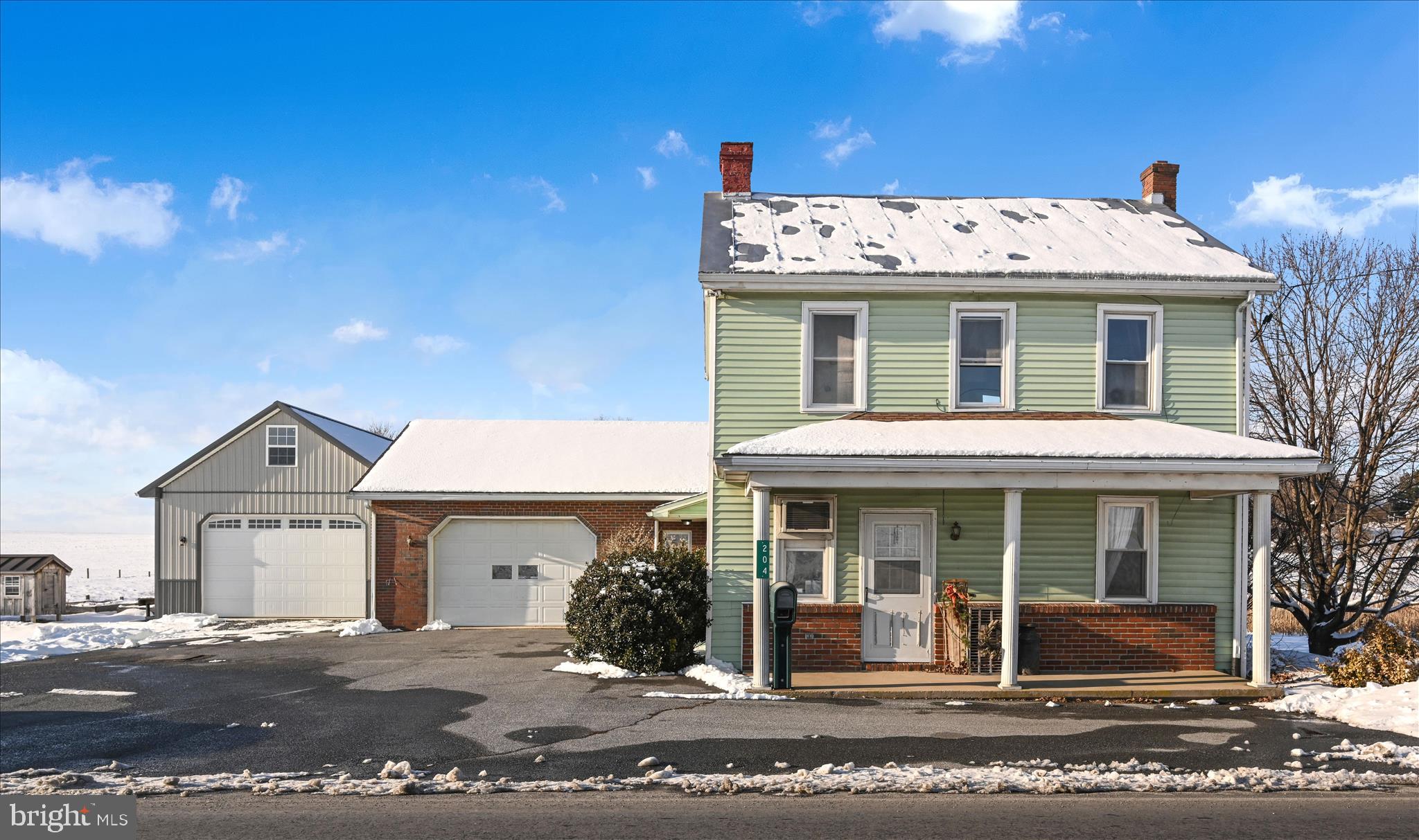 204 Reistville Road Myerstown, PA 17067 - Photo 8 of 55 a view of a white house with large windows