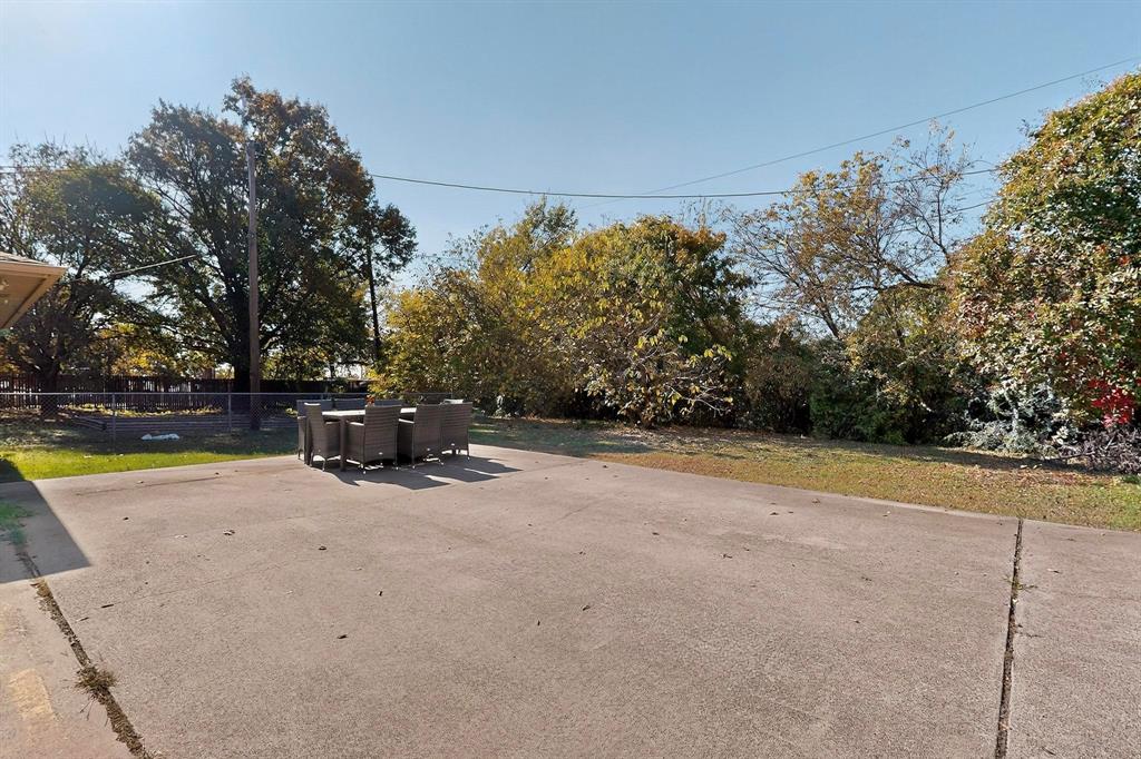 2320 Bernard Street Denton, TX 76205 - Photo 13 of 13 a view of a swimming pool with an outdoor space and seating area