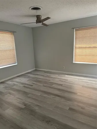 a view of a room that has a window in it