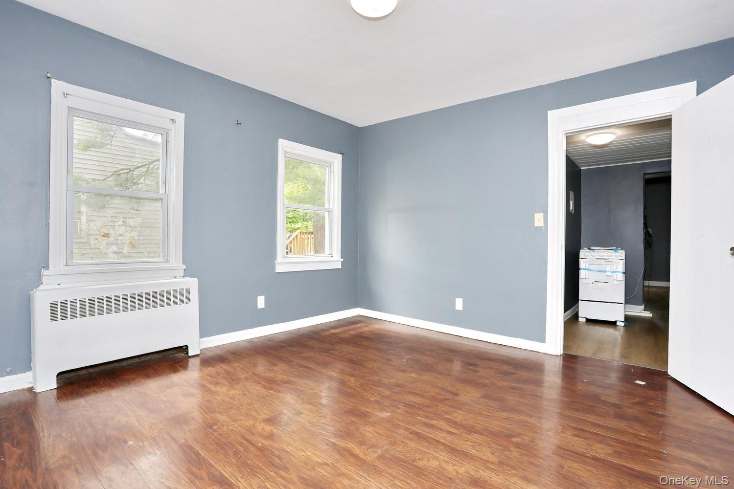 29 Fairview Avenue Spring Valley, NY 10977 - Photo 9 of 19 an empty room with windows and closet