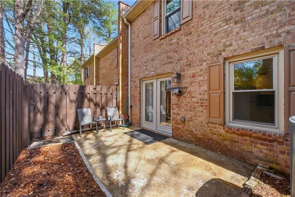 a view of house with backyard of the house