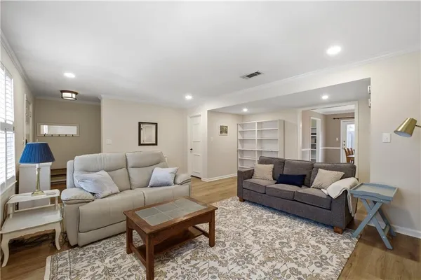 a living room with furniture and a couch