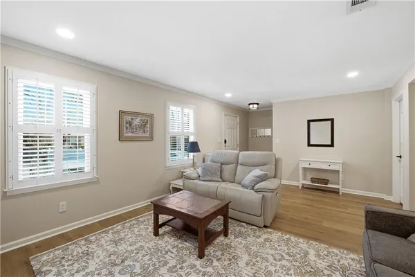 a living room with furniture and a window