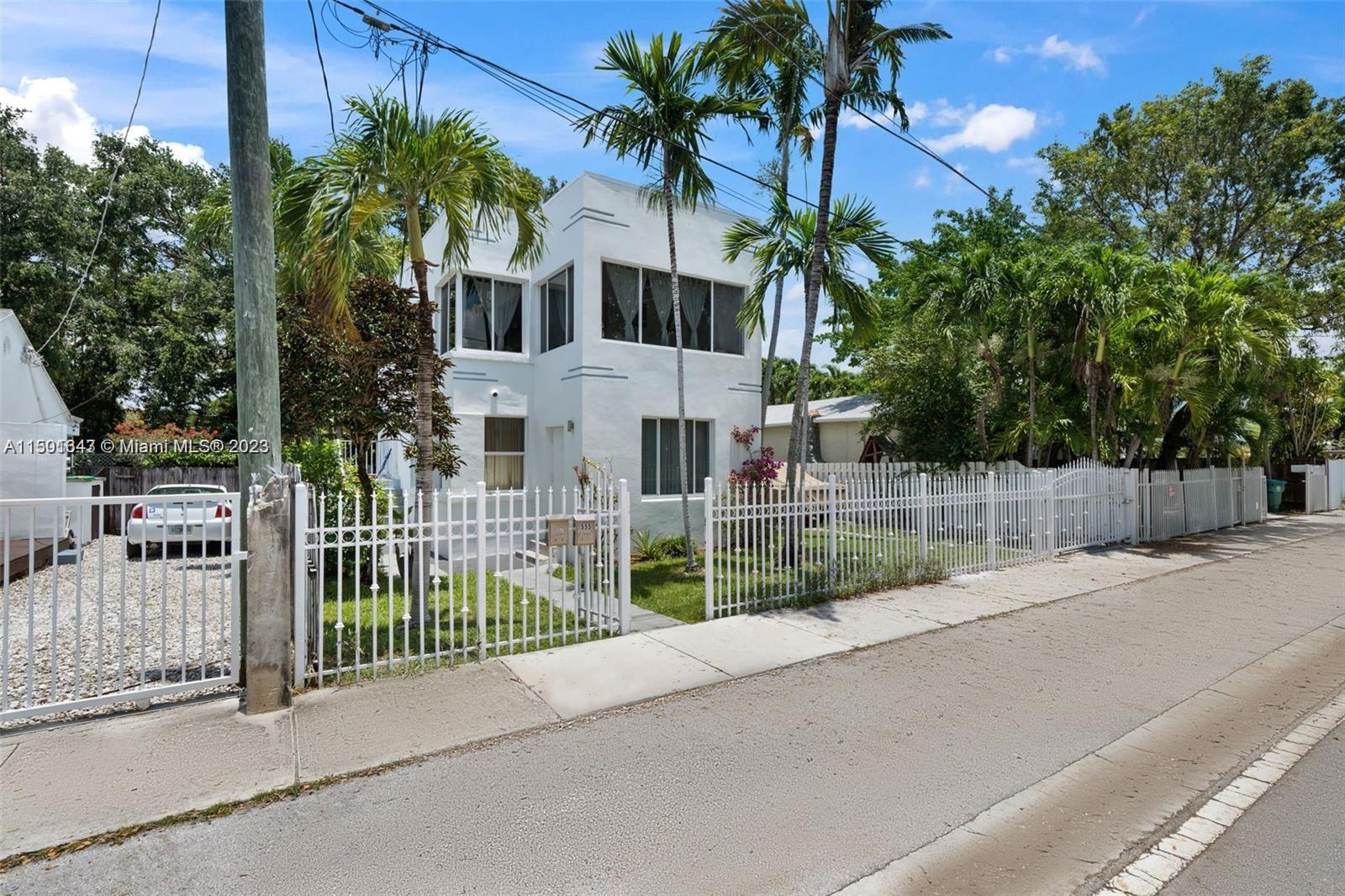 555 Northeast 70th Street Miami, FL 33138 - Photo 19 of 19 a view of street along with house and trees