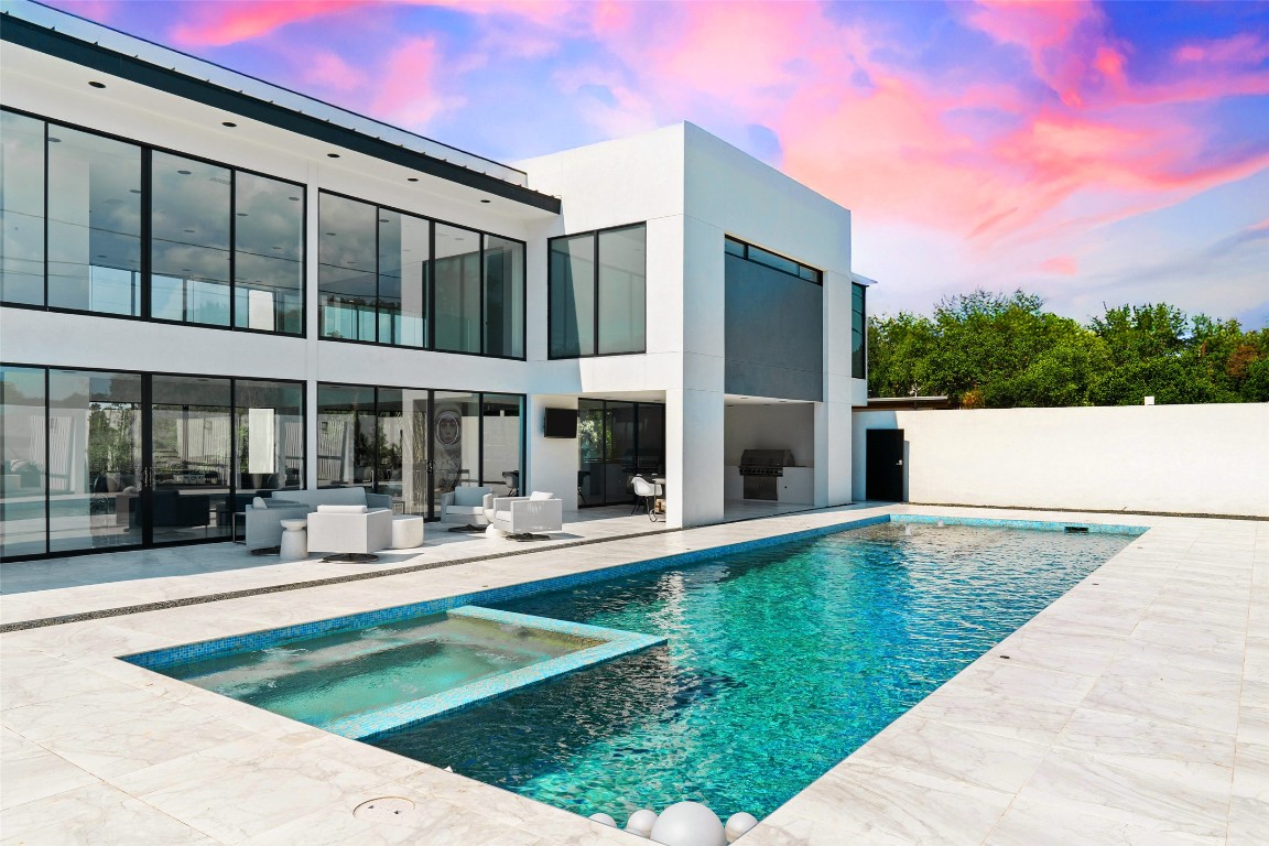 a swimming pool with outdoor view
