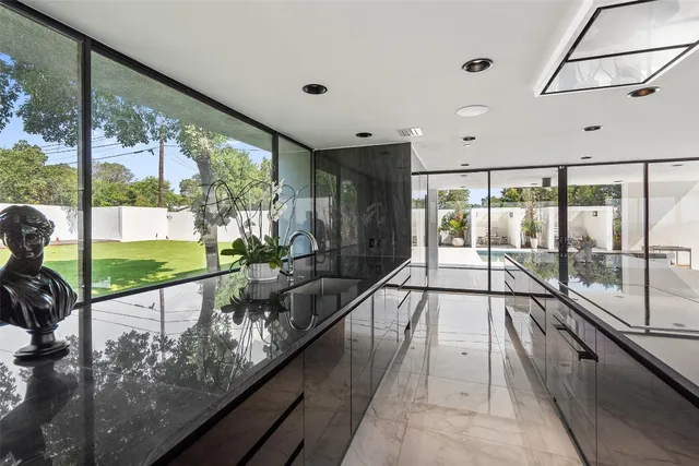 a view of a swimming pool with a balcony